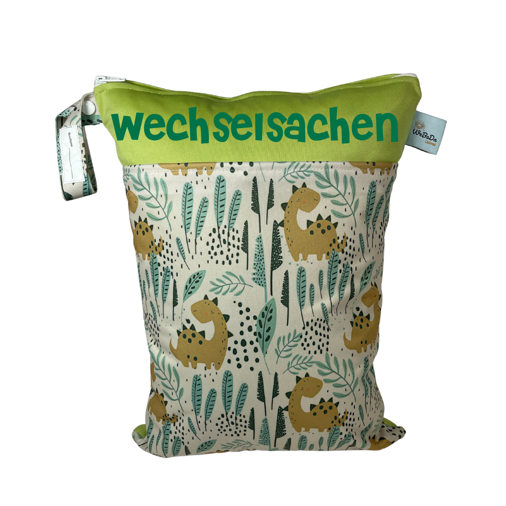 Wetbag „Dinos - blassgrün" - mit Namensaufdruck