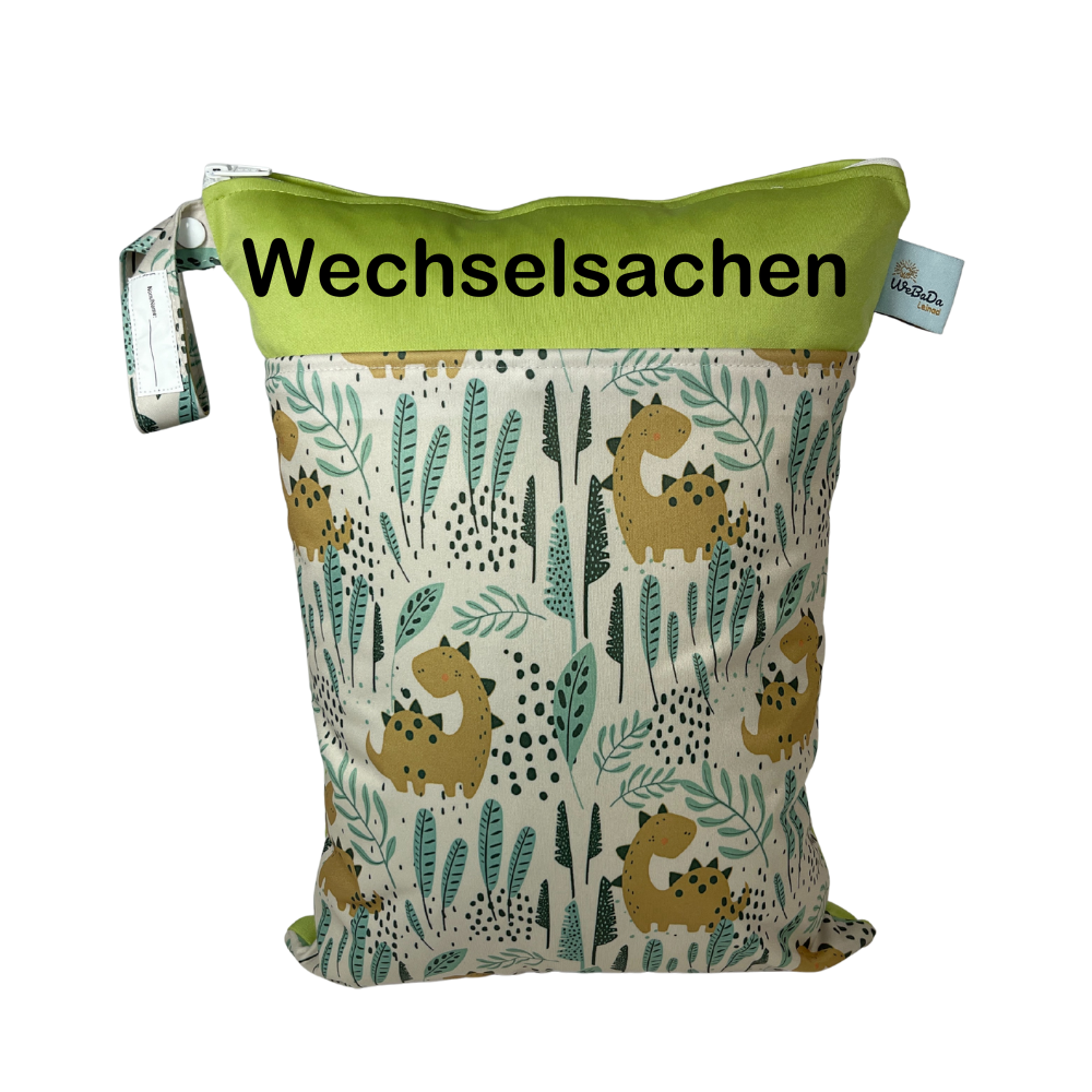 Wetbag „Dinos - blassgrün" - mit Namensaufdruck